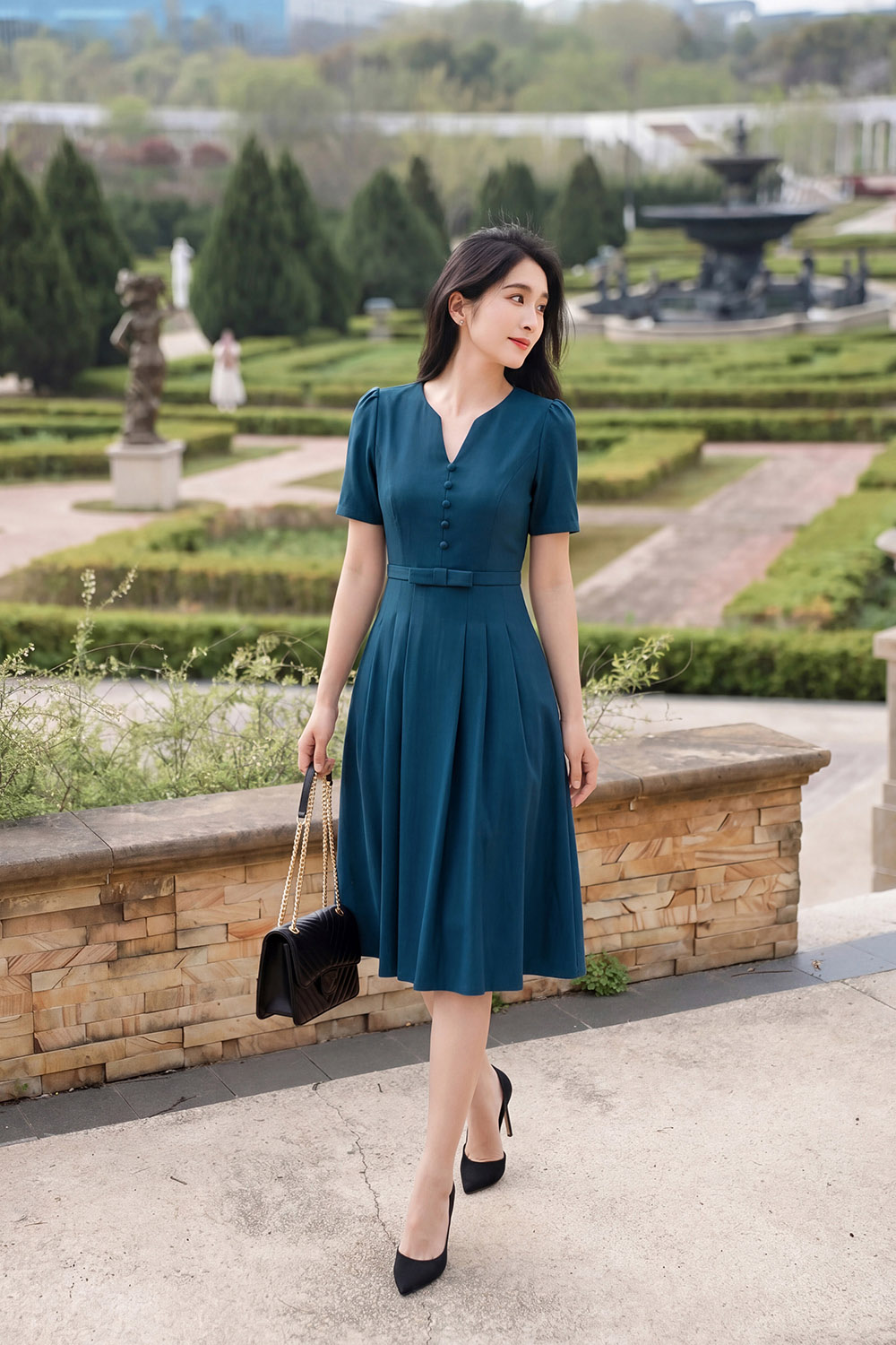 dam-cong-so-dang-xoe-xep-ly-eo-dinh-no-kk185-31 Đầm trung niên dáng xòe xếp ly eo đính nơ