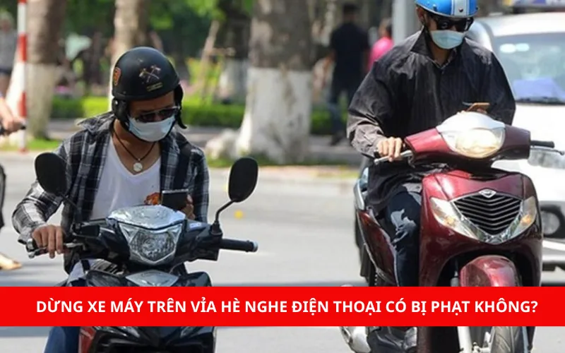 Dừng xe máy trên vỉa hè để nghe điện thoại có bị phạt không?